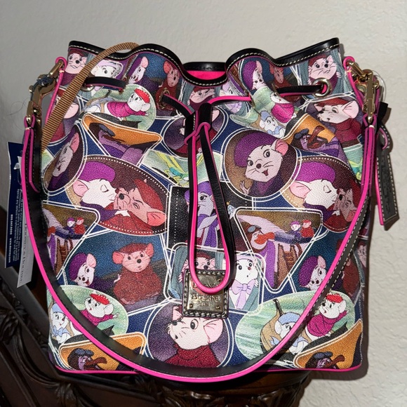 Dooney & Bourke Handbags - Disney  THE RESCUERS Dooney & Bourke Drawstring bag